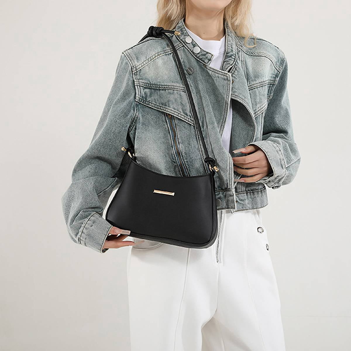 PrettyPettyMerch Women's Faux Leather Shoulder Bag with Knotted Strap in Black (photo 2)